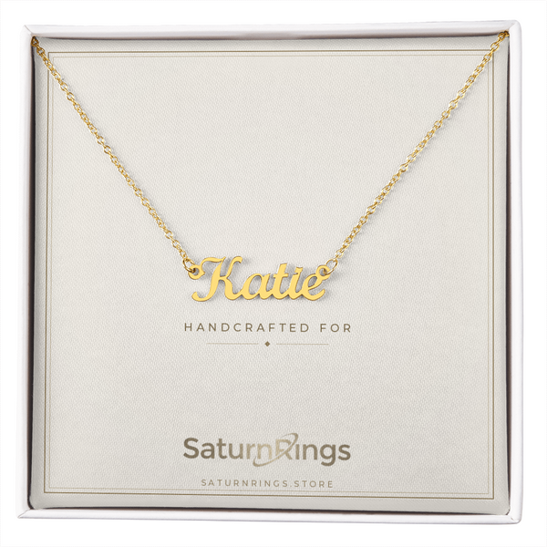 Gold Katie cursive name necklace in its SaturnRings gift box