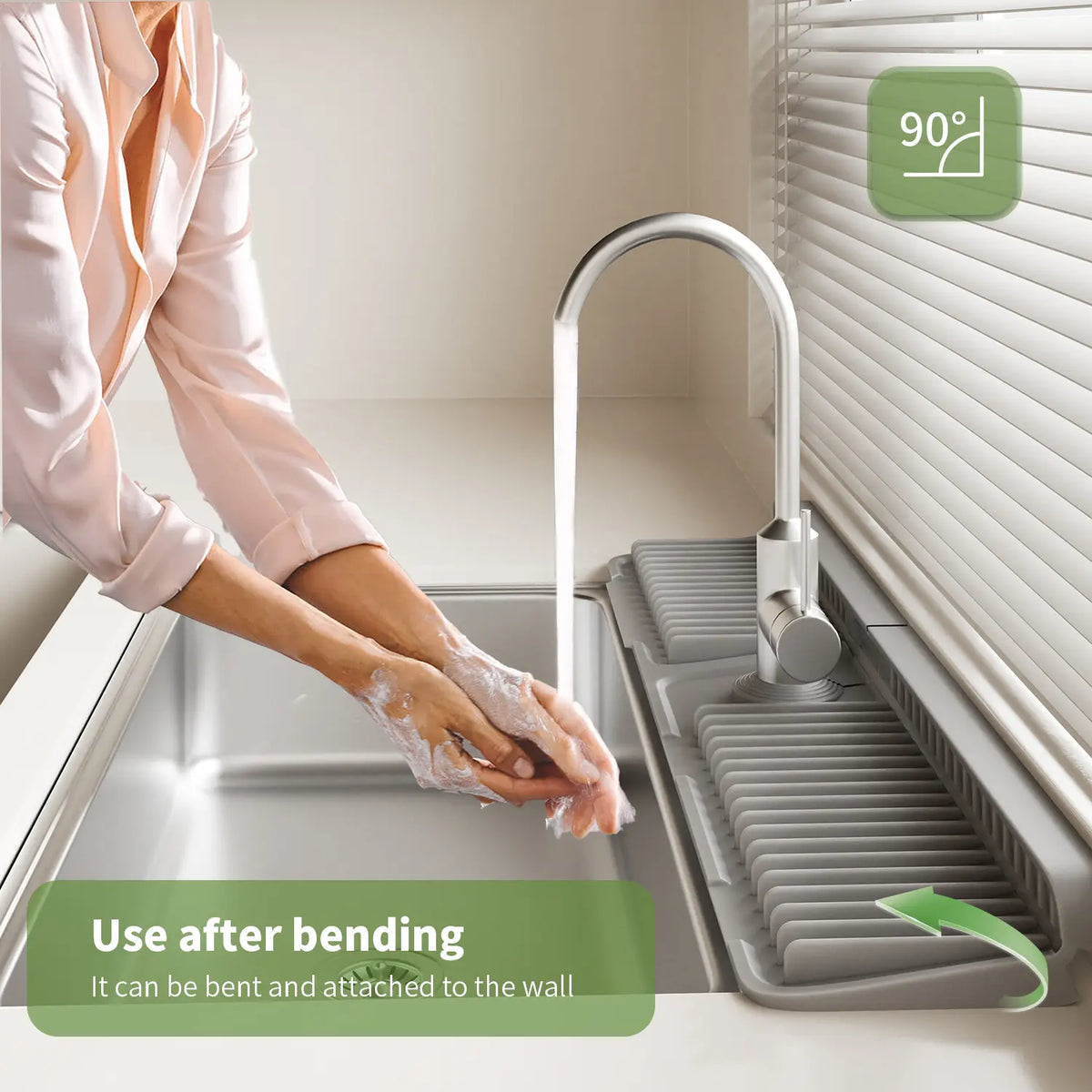 Flexible silicone sink mat wrapped behind a faucet